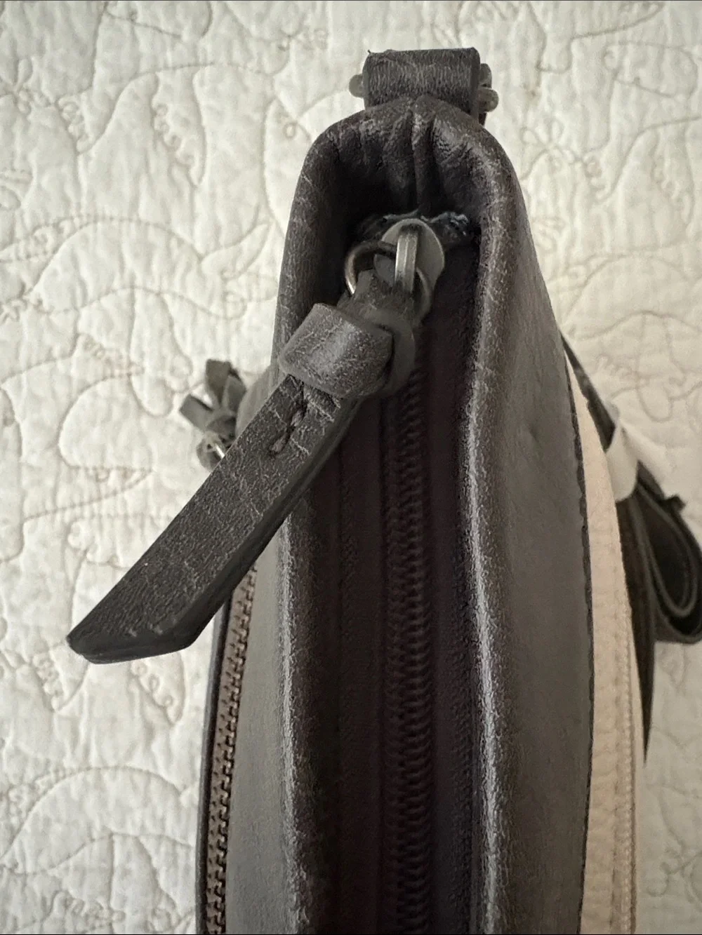 The Sak Leather Messenger Bag in Black and Cream Woven Front